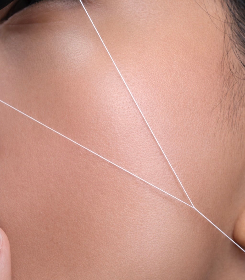 حف الوجه بالخيط